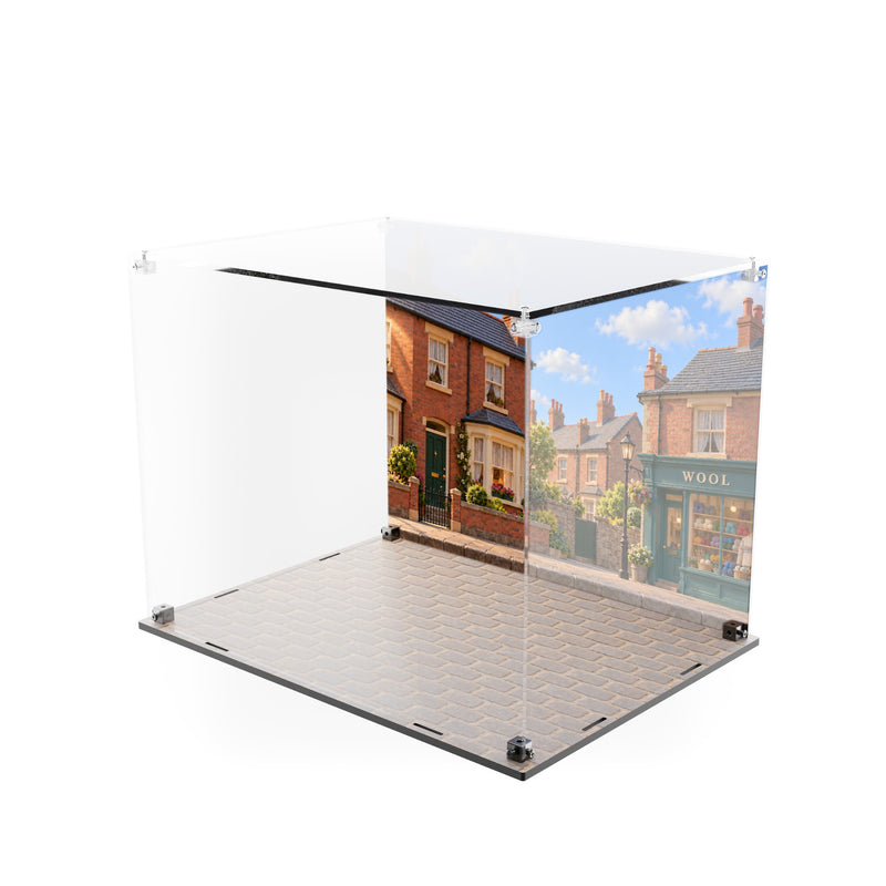 Load image into Gallery viewer, Empty Wallace and Gromit display case with printed street backdrop and cobblestone base, angled view
