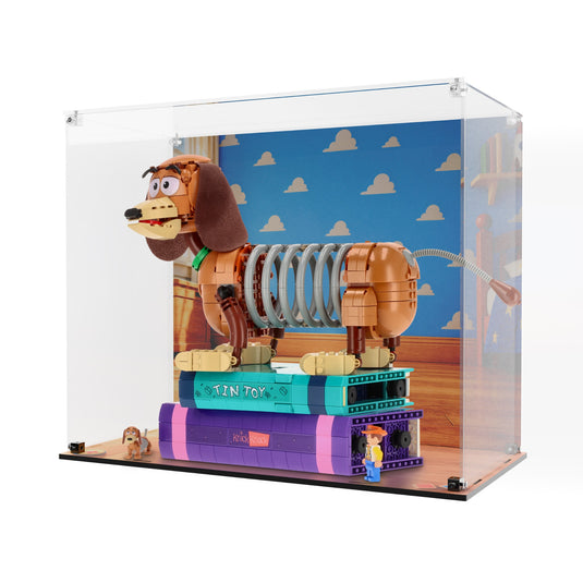 LEGO 43301 Slinky Dog Bookends in an acrylic display case with printed bedroom backdrop and wood-effect base, angled view