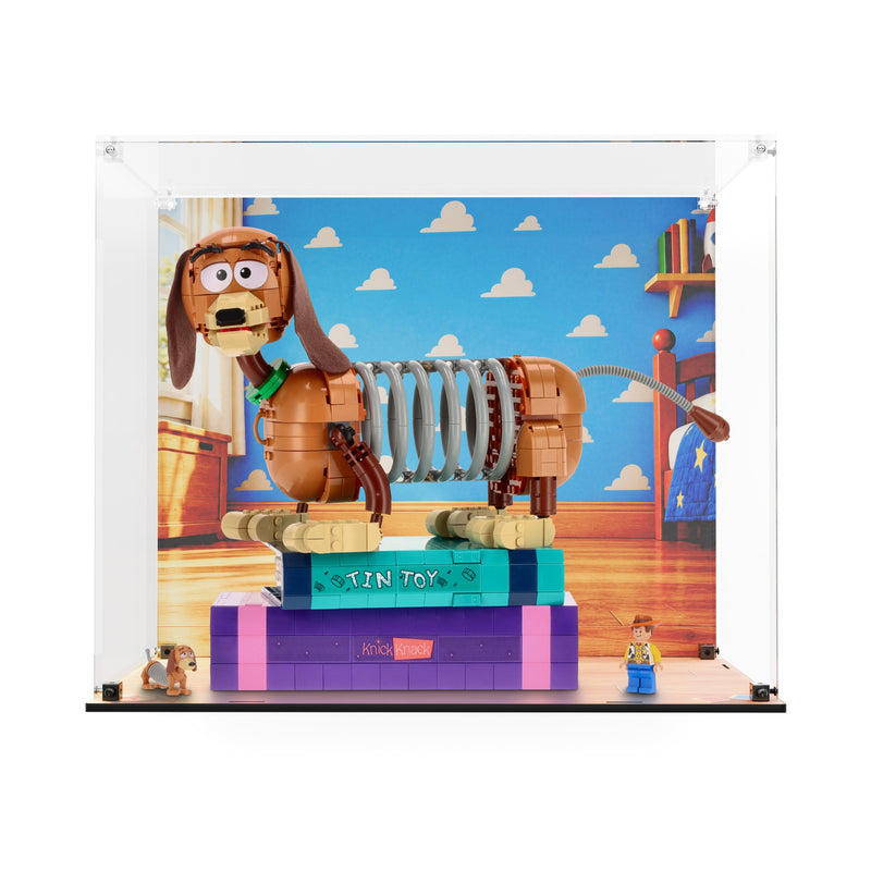 Load image into Gallery viewer, Front view of LEGO Slinky Dog Bookends display case with printed bedroom backdrop and matching printed base
