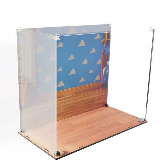 Angled view of empty Slinky Dog display case showing printed bedroom backdrop, wood-effect base and clear acrylic panels