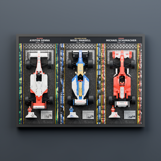 Triple F1 wall display with LEGO Senna, Mansell and Schumacher cars, straight front view on a grey wall
